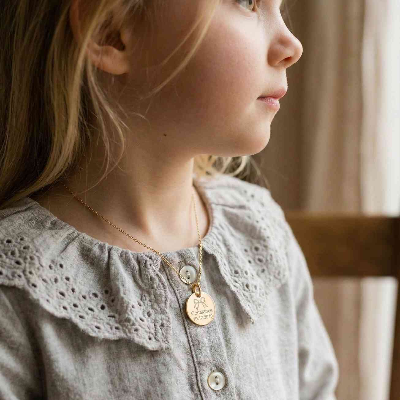 ‘Bow’ Christening Medal