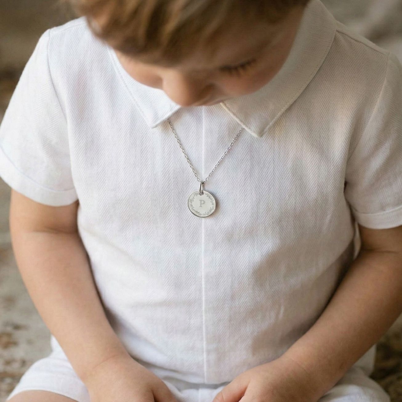 Personalised christening medal with a silver crown